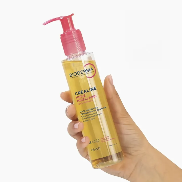 Créaline huile micellaire nettoyante démaquillante Bioderma 150 ml flacon main